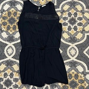 Girls extra large black romper. Probably can fit woman’s extra small.